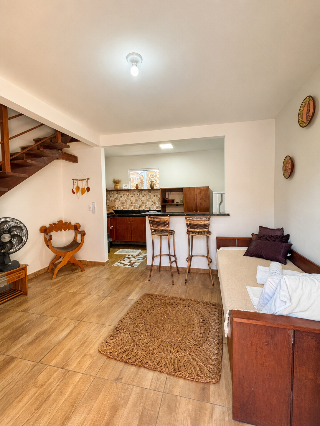 Sala e escada do Quarto Duplex Confort